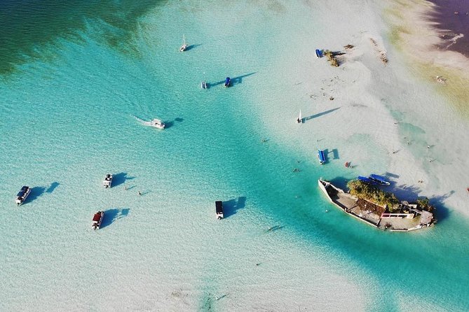 1 Day Tour to Bacalar, Cenotes and 7 color Lagoon with lunch from Cancun - The pontoon route through Bacalar’s blue water