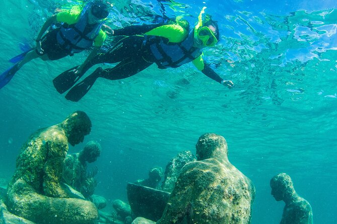 2-Hour Snorkeling Paradise Reef in Cancún Underwater Museum - Entering the Water From the Floating Platform