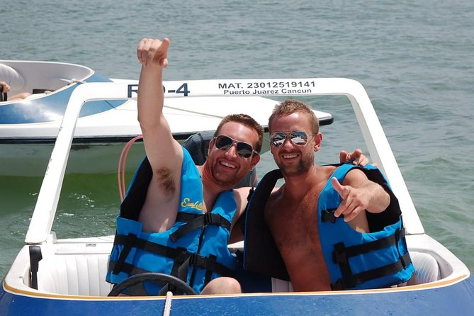 5-in-1 Adventure in Cancun: ATVs, Ziplines, Speed Boat, Snorkel and Cenote Swim - Ziplines, cenote swimming, and the cliff jump