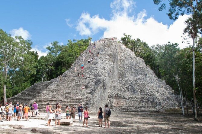 5x1 Tour: Tulum Coba Cenote Mayan Village and Playa del Carmen - A short walk along Quinta Avenida
