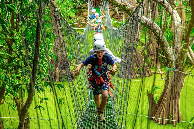 Adrenaline Adventure, Zip Line, ATV and Cenote Maya - Getting ready with helmets, harnesses, and rules