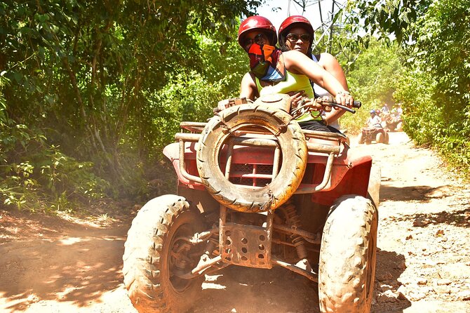 Adrenaline Tour with ATV, Zipline, and Cenote from Cancun - ATV riding on rough jungle trails