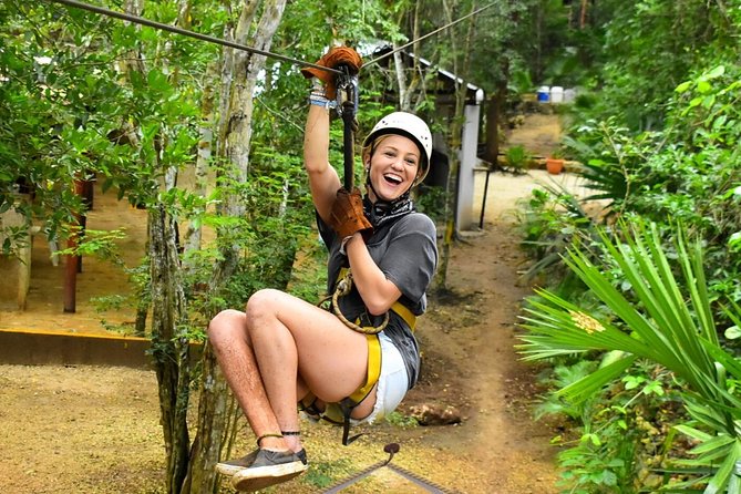 Adrenaline Tour with ATV, Ziplines and Cenote from Cancun - ATV riding on rough jungle tracks