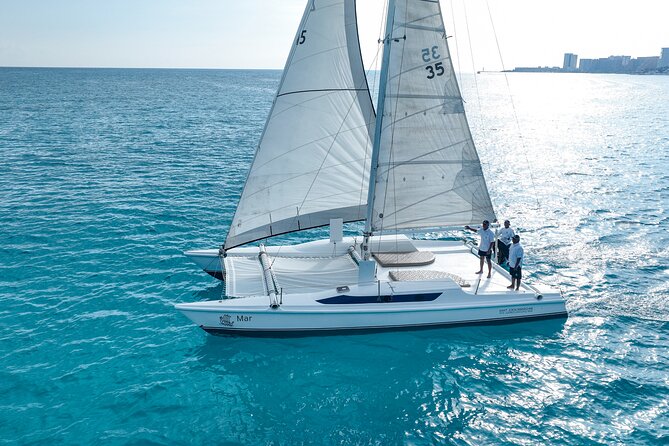 All-Inclusive Isla Mujeres Catamaran with Free Transportation - Boarding the Oceanix catamaran