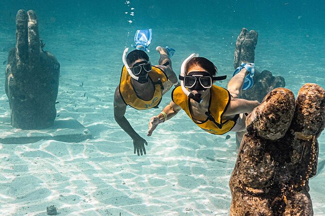 All-Inclusive Isla Mujeres Catamaran with Free Transportation - What the $119 price really covers