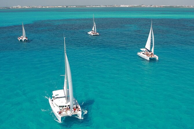 All-Inclusive Isla Mujeres Catamaran with Free Transportation - Snorkeling at El Meco Reef