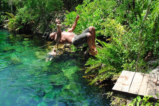Amazing Adventure Experience in Riviera Maya: ATV'S, ZIPLINING AND MAYAN CENOTE - Riding the shared ATV through the forest