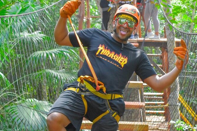 Amazing ATV Tour, Ziplines and Cenote Swim with Lunch and round trip included - Zip lines above the trees
