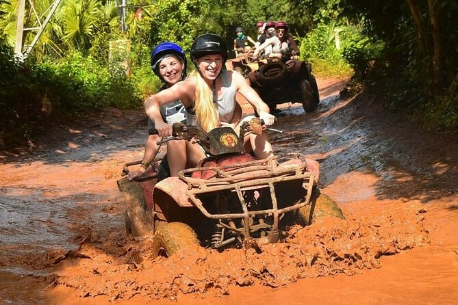 Amazing ATV with Zip Lines and Swim in Cenote with Round Transportation - A bumpy ATV ride through Ruta de los Cenotes