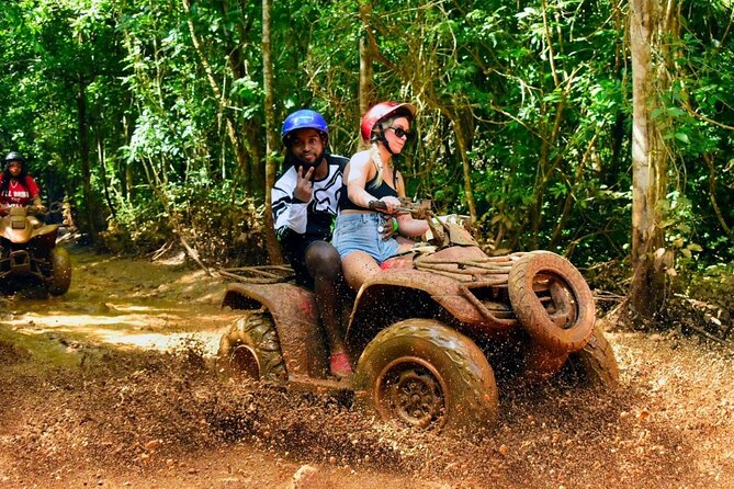 Amazing ATV with Zip Lines and Swim in Cenote with Round Transportation - Cooling off in a natural cenote