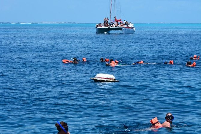 Amazing tour to the beauty Isla Mujeres with Snorkel and open bar - Spinnaker: a fun extra with a weather clause