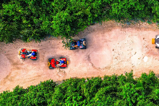 ATV Jungle Adventure with Ziplines, Cenote & Transportation - Three ziplines above the trees