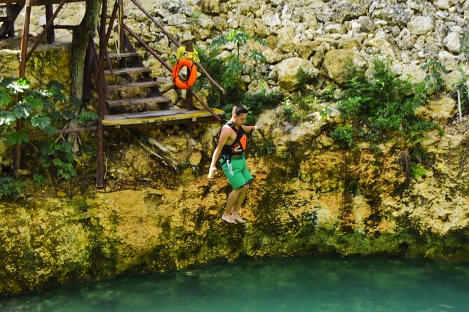 ATV's (shared), Ziplines & Cenote! Half-Day with Transportation from Cancun - Cooling off in a clear cenote