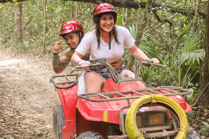 ATV shared experience, Ziplines and Cenote swim experience in one Adrenaline day - Riding an ATV through the jungle