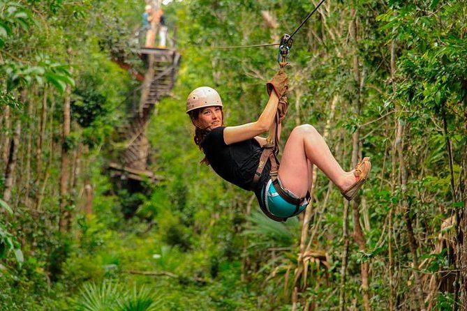 ATV (shared), Horse Back Riding, Ziplines, & Cenote from Cancún - ATV riding on jungle trails