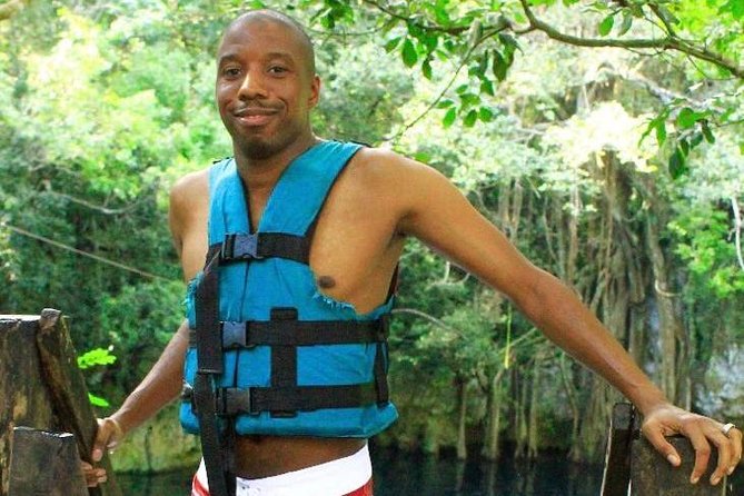 ATV Tour with Cenote swim, Ziplines, Transportation and Lunch Included - Swimming in a Mayan cenote