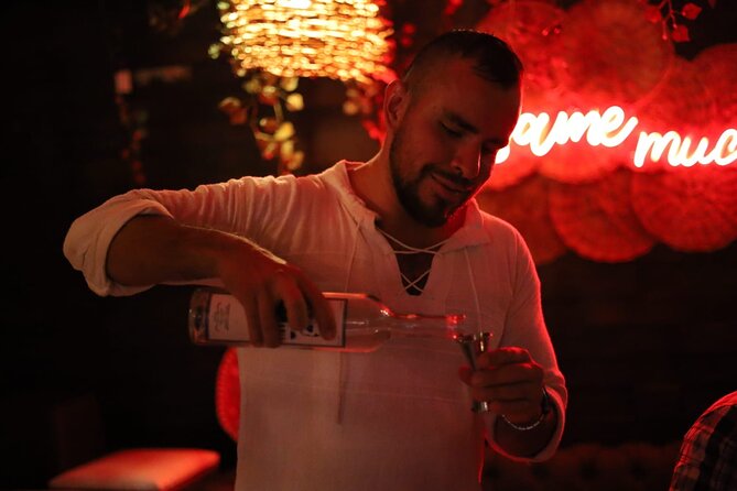 Authentic Artisanal Mezcal tasting in Cancun with appetizers. - How the three-mezcal flight works
