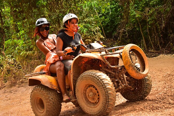 Awesome ATV experience in the jungle with cenote swim and ziplines included - Swimming in the sacred cenote