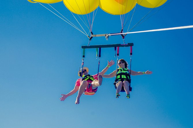 Cancun Adventure: Reef Snorkeling & Parasailing Experience - Guides, equipment, and group size