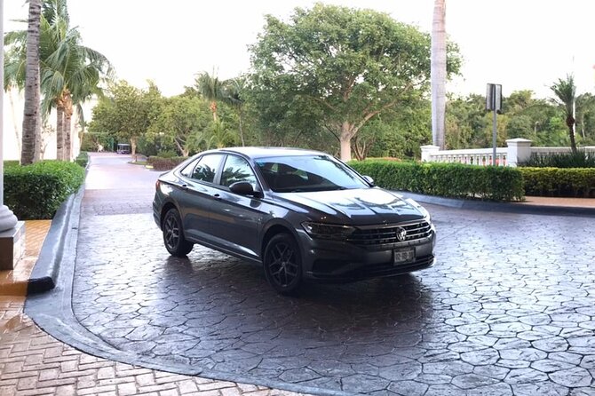 Cancun Airport Transfer to Ferry Puerto Juarez Cancun Roundtrip - The airport pickup at Ground Transportation