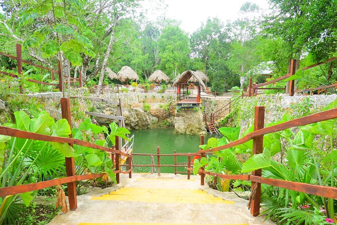 Cancun ATV Tour with Zipline, Cenote & Transportation - Three short ziplines above the jungle