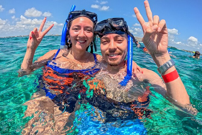Cancun Catamaran: Isla Mujeres, Snorkeling, Drinks & Buffet Lunch - Playa Norte and your Isla Mujeres window