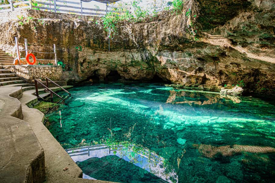 Cancun: Cenotes El Retoño entrance with transportation, lunch, and guided tour. - Arriving at the two cenotes