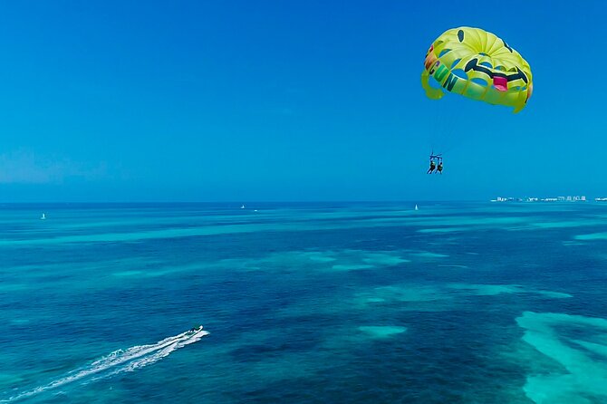 Cancun Combo Adventure: 4-Reef Stop Snorkeling and Parasail Ride - Pickup, marina arrival, and the dock fee