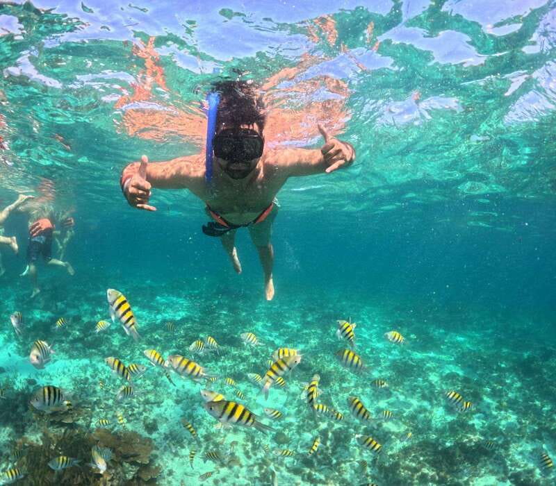 Cancun: Isla Mujeres Catamaran + Coco Bongo Show - Guides, languages, and the human side of the day