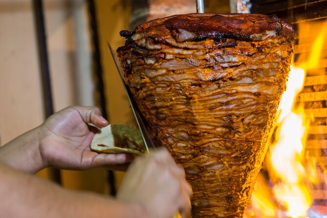 Cancun Local Experience: Taco and Beer Food Tour - Stop four: The legendary al pastor taco