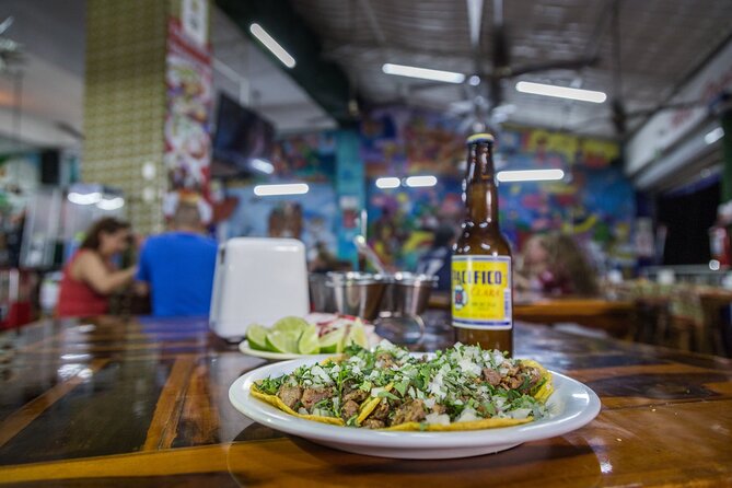 Cancun Local Experience: Taco and Beer Food Tour - Stop one: Mayan flavors in a panucho
