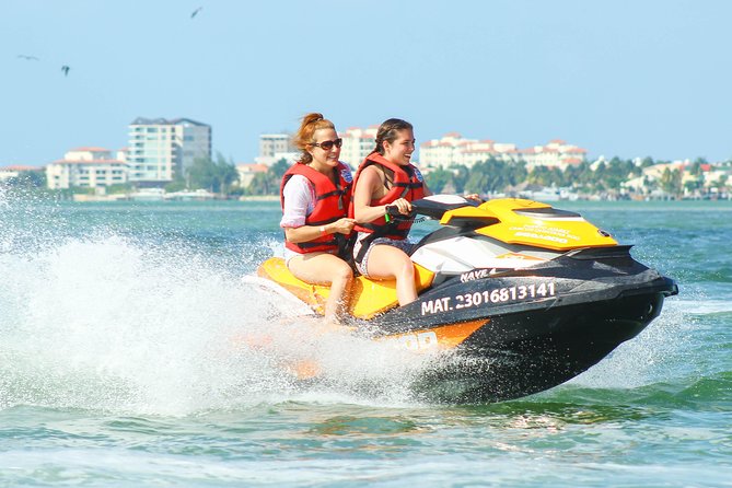 Cancun Mangrove Jet Ski Tour: 2 riders per jet ski - Passing La Isla by jet ski