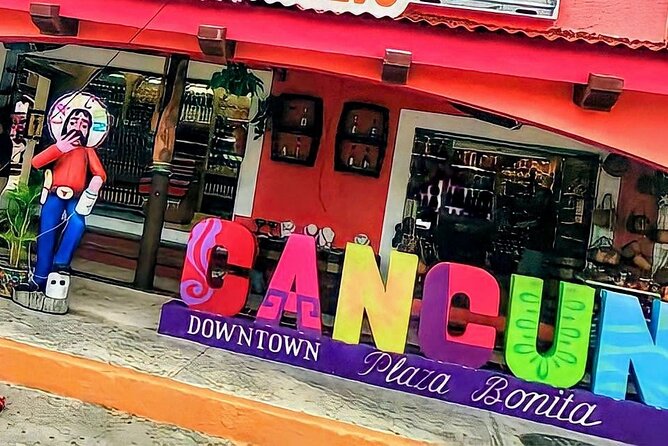 Cancun Private Shopping Tour! City Sightseeing - Playa Delfines: finish with sand, sky, and Cancun’s color sign