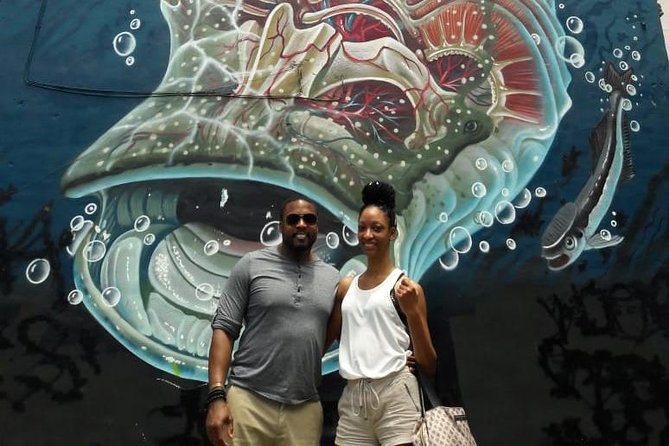 Cancun Street Food Tour with Food Stalls, Local Market and Murals - Bonampak murals and a different side of downtown
