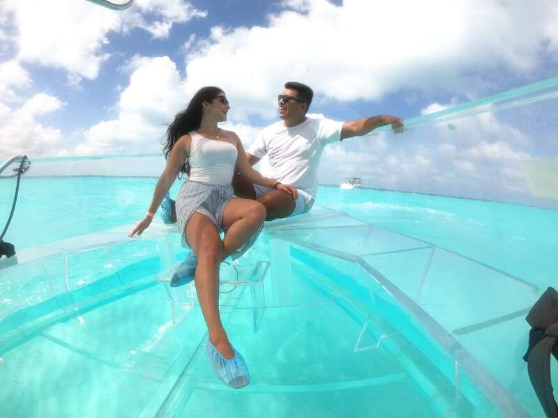 Cancun: Transparent Boat Tour with Drinks - The clear hull and the wildlife below