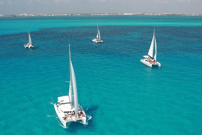 Catamaran adventure to Isla Mujeres with Snorkel,Buffet,Open Bar and Beach Club - Snorkeling at Isla Mujeres