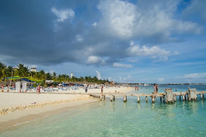 Catamaran adventure to Isla Mujeres with Snorkel,Buffet,Open Bar and Beach Club - What the $55 Price Really Covers