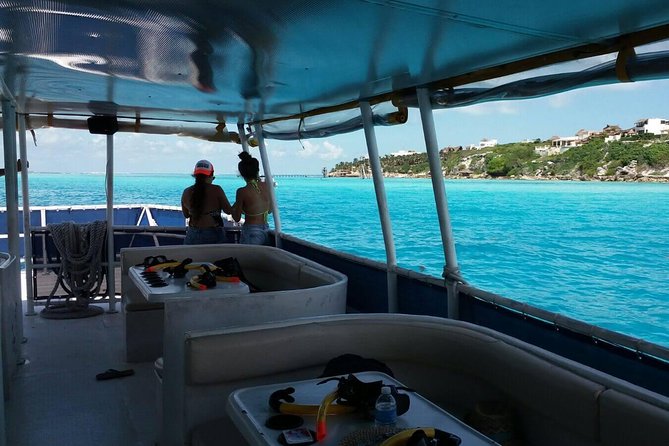 Catamaran Adventure Tour Isla Mujeres Unlimited from Cancun with Transportation - Drinks, lunch, and the party-boat atmosphere