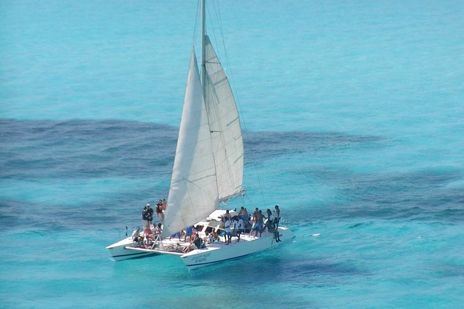Catamaran Isla Mujeres Tour with Hotel Pick Up included - What the $89 price includes, and what it does not