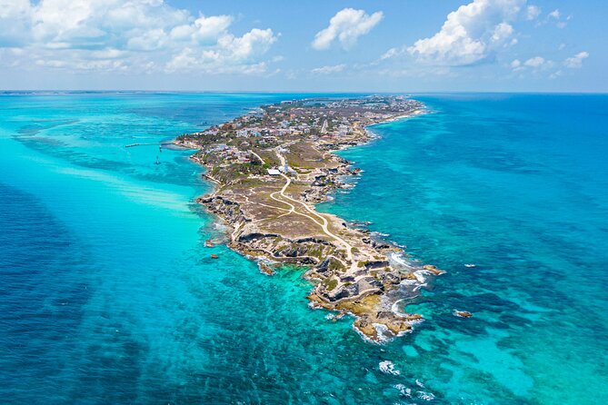 Catamaran Isla Mujeres Tour with Hotel Pick Up included - Boat atmosphere, music, and group size