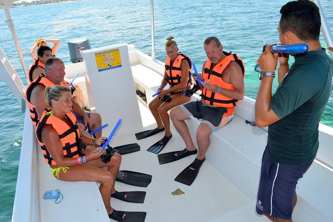 Catamaran Sail and Snorkeling Tour with Open Bar in Puerto Morelos - Sailing out from Marina El Cid Puerto Morelos