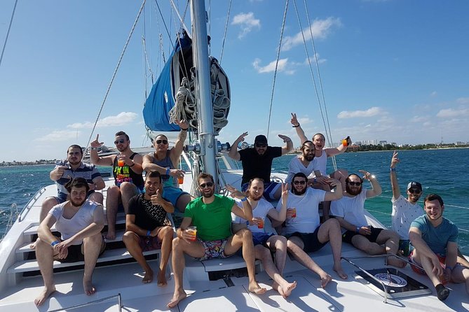 Catamaran Sailing Experience & Snorkeling Tour to Isla Mujeres - Buffet lunch, open bar, and the social mood