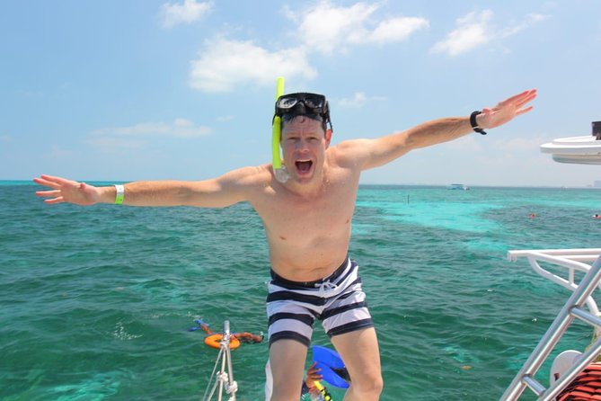 Catamaran Sailing Experience & Snorkeling Tour to Isla Mujeres - Timing, delays, and hotel pickup