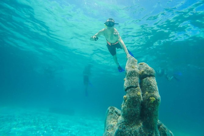 Catamaran Sailing & Snorkeling Experience Isla Mujeres from Playa Del Carmen - Punta Sur and the island’s dramatic edge