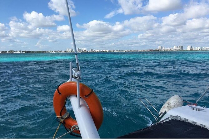 Catamaran to Isla Mujeres, Open bar, buffet, Beach Club Included - Two hours to explore the island