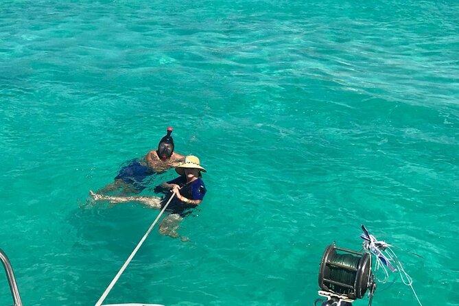 Catamaran to Isla Mujeres, Open bar, buffet, Beach Club Included - The first hour: music, drinks, and open water