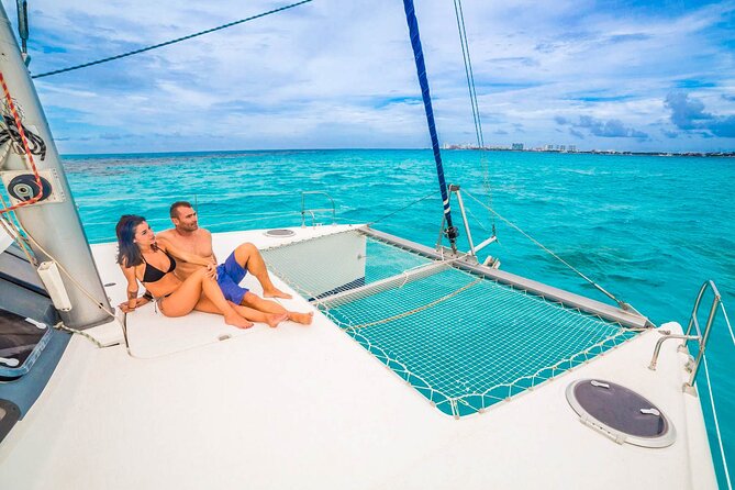Catamaran to Isla Mujeres Snorkeling Tour with Open Bar and Lunch - The beach club and the late buffet