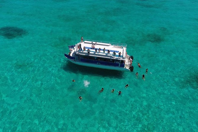 Catamaran Tour to Isla Mujeres all Included - Maya Reef snorkeling and the upper-deck jump