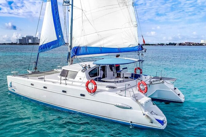 Catamaran Tour to Isla Mujeres from Cancún with Bar and Lunch - The snorkeling stop near Isla Mujeres
