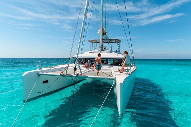 Catamaran Tour to Isla Mujeres, Open bar, Lunch, Snorkeling, Beach Club Included - El Meco Reef and the Short Snorkel Stop